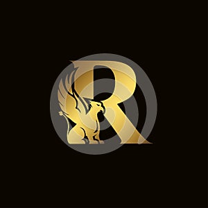Griffin silhouette inside gold letter R. Heraldic symbol beast ancient mythology or fantasy. Creative design elements for logotype