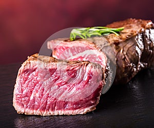 Grill beef steak. Portions thick beef juicy sirloin steaks on grill teflon pan or old wooden board
