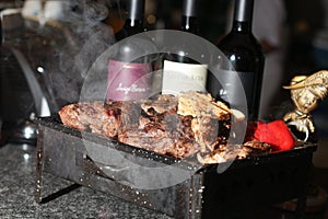 Grill and bottle of wine photo