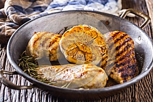 Grill Chicken Breast. Roasted and grill chicken breast with lettuce salad tomatoes and mushrooms