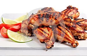 Grill chicken wings, cut out on white background