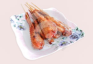Grill chicken wings Thai style on dish with clipping path