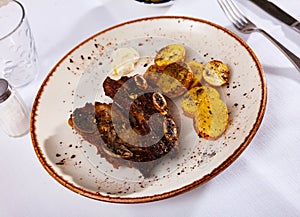 Grill dish in Spain churrasco de ternera, grilled beef spare ribs photo