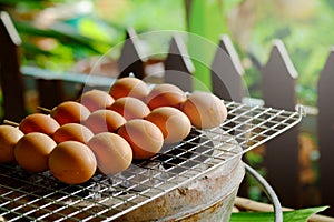 Grill egg stick on grille is organic Thai tradition steed food in local market