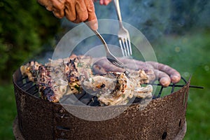 Grill garden party with sausages and meat