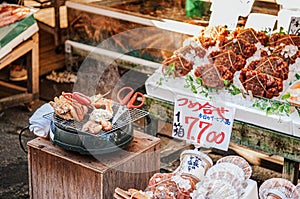 Grill Japanese horsehair crabs or Kegani at Hakodate Asaichi fish market photo