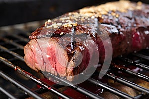 grill marks visible on the steak basted with red wine reduction
