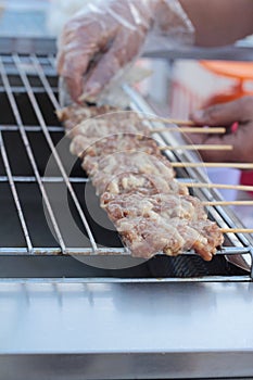 Grill pork on stove grill.