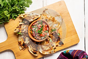 Grill steak mulitas with fresh sauce and cheese on white background. Mexican food