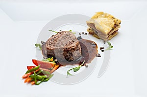 Grill steak with roasted vegetables and sauce, side dish potatoes, gastronomy, menu