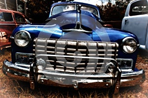 Grill of Vintage Blue Automobile