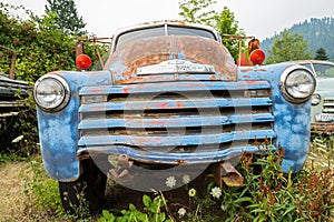 The grille of a blue 1949 Chevy 6400 truck in Idaho, USA - July 26, 2021