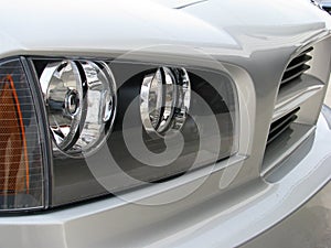 Grille and lights of new silver car