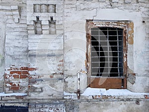 Lattice on the window in an old ruined house