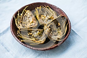 Grilled artishoke  flat lay on white background