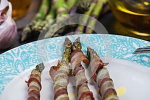 Grilled asparagus wrapped in pancetta or bacon, italian cousine