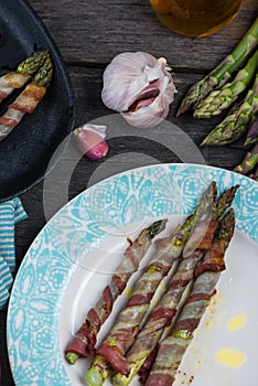 Grilled asparagus wrapped in pancetta or bacon, italian cousine