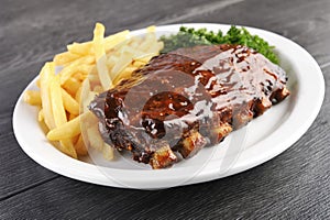 Grilled barbecue ribs photo