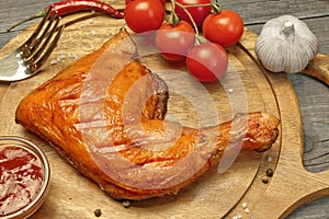 Grilled BBQ Chicken Leg Quarter On Wood Board, Top View