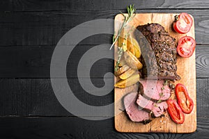 Grilled beef on a cutting board