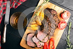 Grilled beef on a cutting board