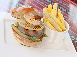 Grilled beef and seafood burger