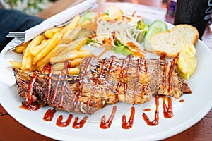 Grilled beef steak with salad on a plate