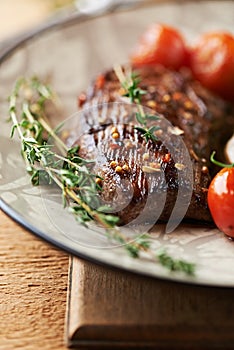 Grilled beef steak with thyme