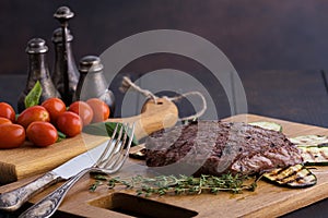 Grilled beef steak with vegetables and spices