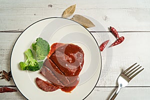 Grilled Beef Steak on the wooden table