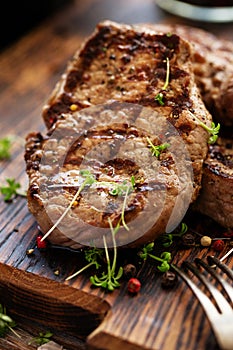 Grilled beef steaks with spices