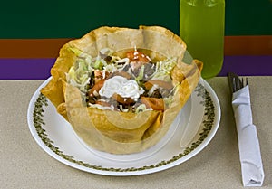 Grilled beef and vegetables taco salad on plate