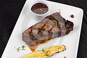 Grilled black angus steak New York