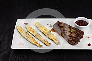 Grilled black angus steak New York