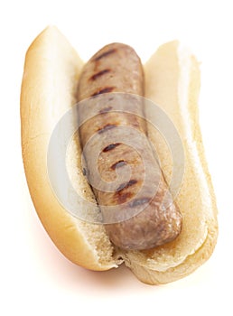 Grilled Bratwurst in a Hotdog Bun on a White Background