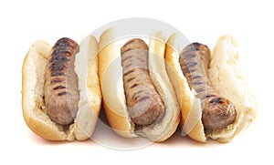 Grilled Bratwurst in a Hotdog Bun on a White Background