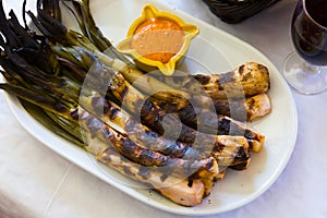 Grilled calcots with romesco sauce