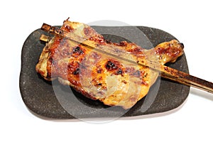 grilled chicken with bamboo sticks