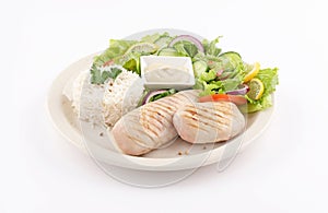 Grilled chicken breast dish with salade and rice