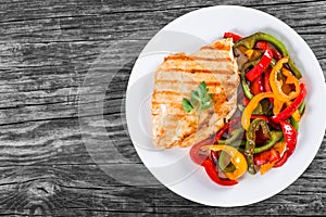 Grilled Chicken breast fillet and fried bell pepper , top view