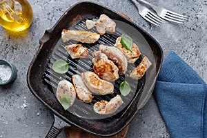 Grilled chicken breast on pan