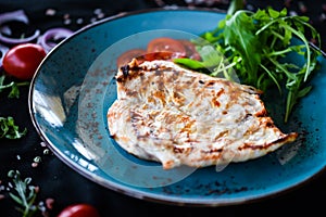 Grilled chicken breast with roasted vegetables