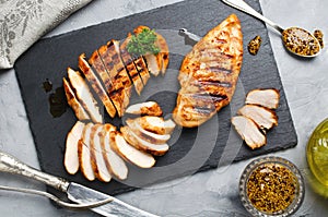 Grilled chicken fillets in a spicy marinade