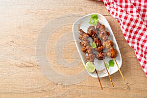 Grilled chicken gizzard skewer with herbs and spices
