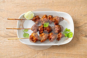 Grilled chicken gizzard skewer with herbs and spices