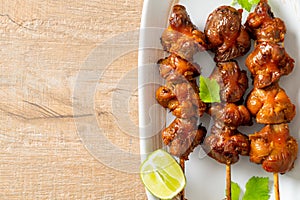 Grilled chicken gizzard skewer with herbs and spices