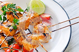 Grilled chicken kebabs with tikka masala sauce