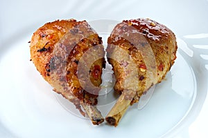 Grilled chicken legs with spicy