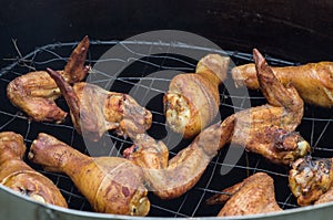 Grilled chicken legs and wings