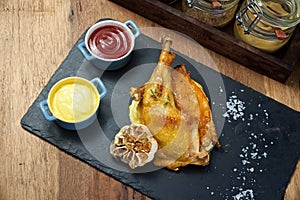 Grilled chicken with mash potatoes dish from top view